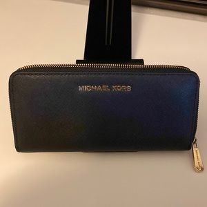 Black MK wallet with Gold accents